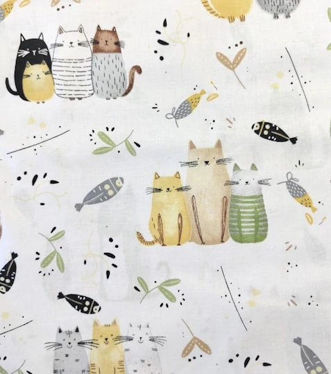 Bavlněná látka kočičí rodinka žlutá