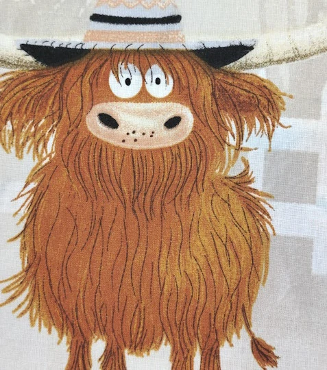 Bavlněná látka chlupaté krávy na béžové