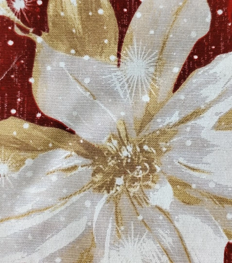 Vánoční dekorační látka – Vánoční hvězda (Poinsettia) na červené